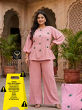 Tailored tunic top with premium jewel brooch/motifs paired with comfortable wide-leg trousers