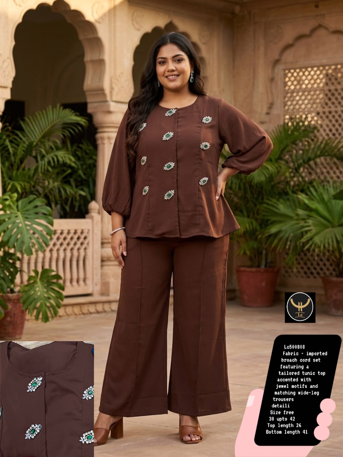 Tailored tunic top with premium jewel brooch/motifs paired with comfortable wide-leg trousers