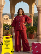 Tailored tunic top with premium jewel brooch/motifs paired with comfortable wide-leg trousers