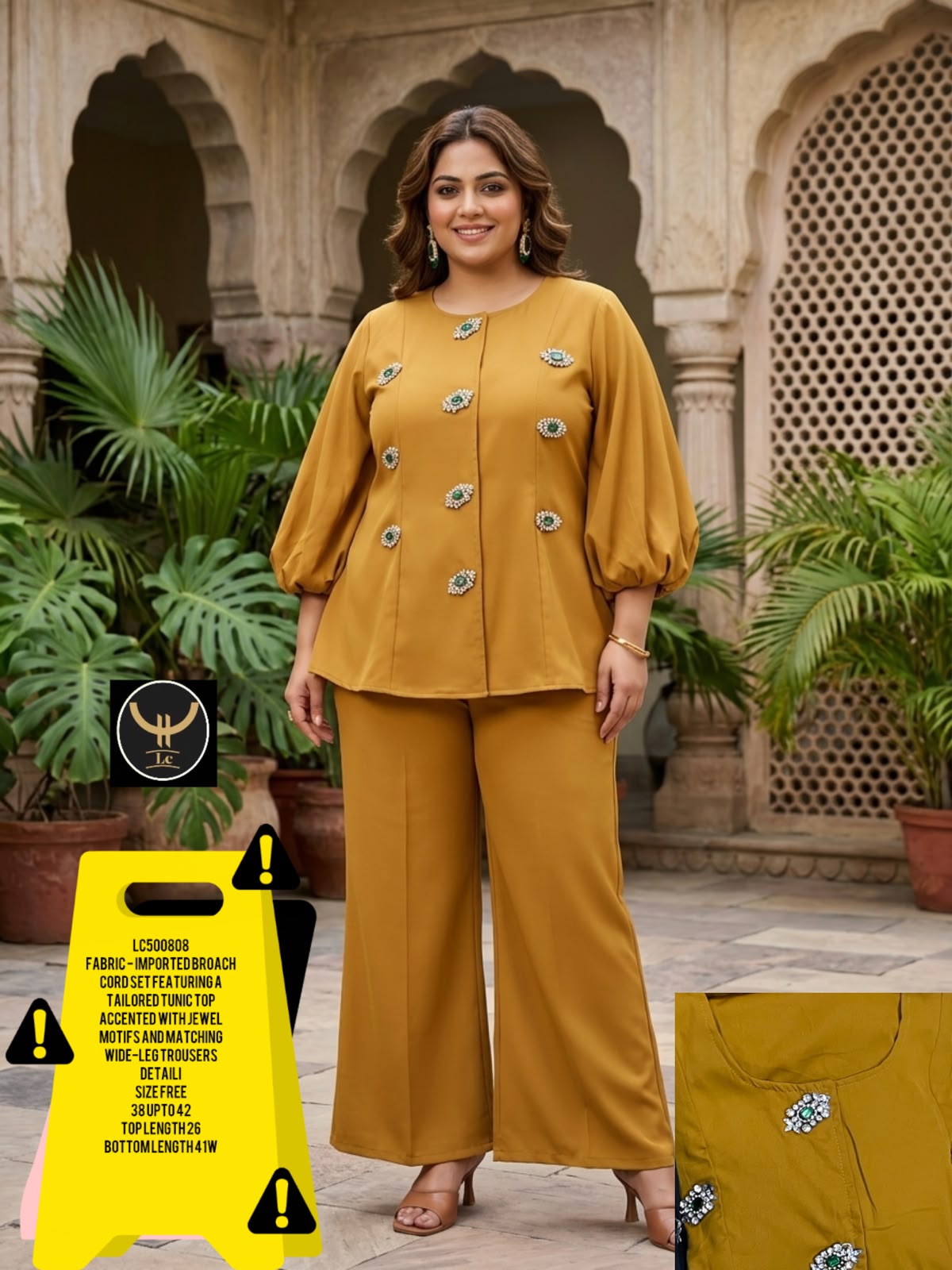Tailored tunic top with premium jewel brooch/motifs paired with comfortable wide-leg trousers