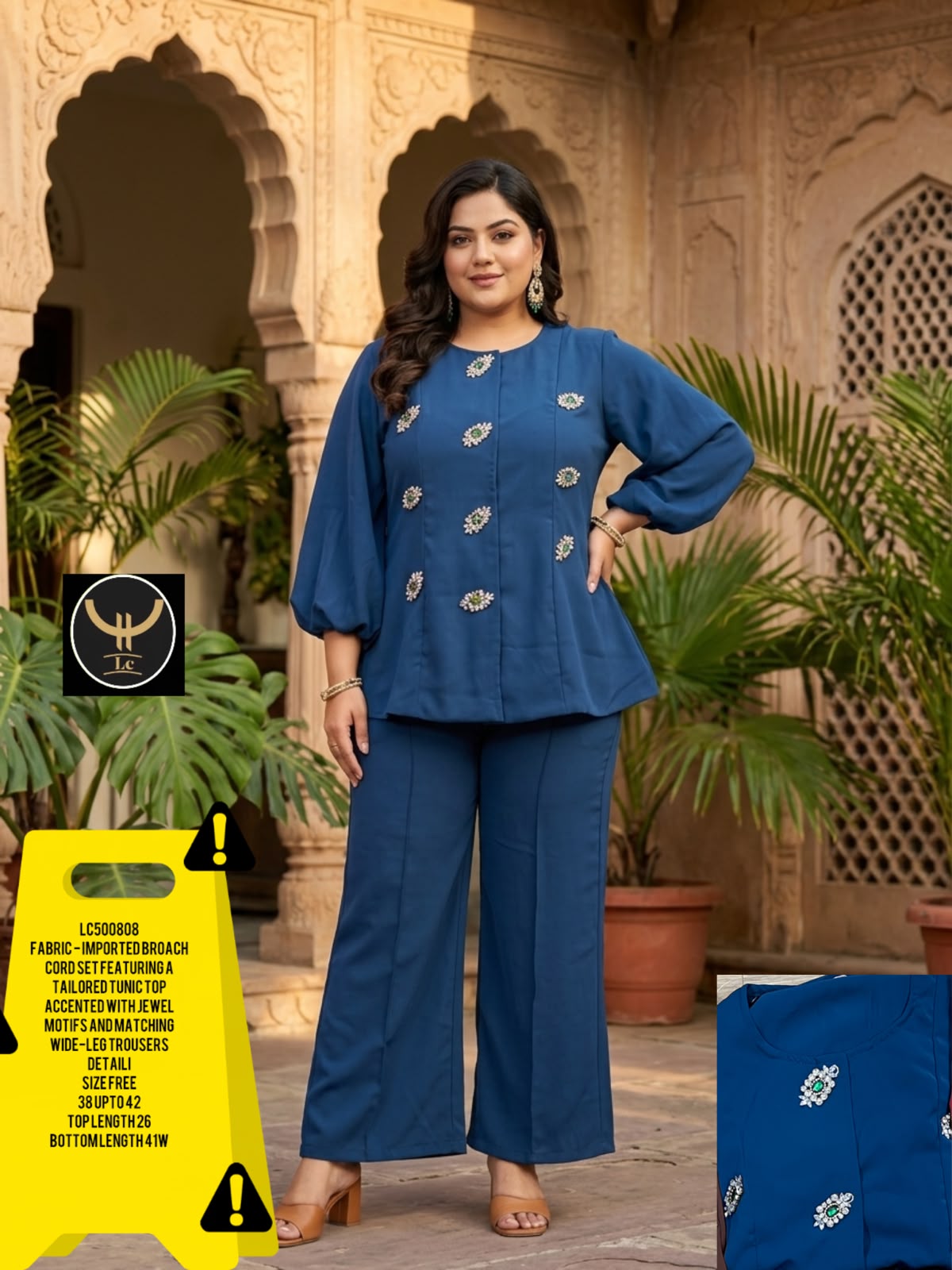 Tailored tunic top with premium jewel brooch/motifs paired with comfortable wide-leg trousers